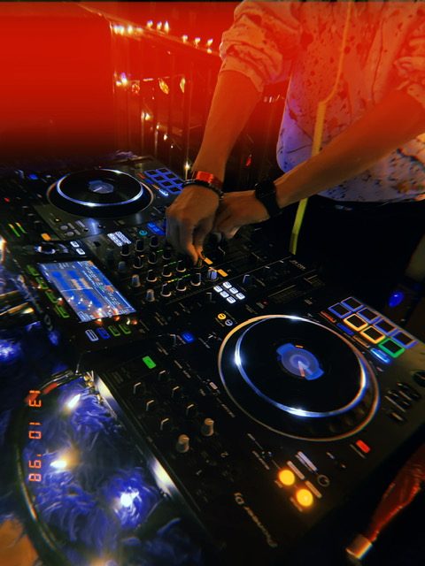 Close-up of Pioneer DJ controller during a Kitty Bus rooftop set